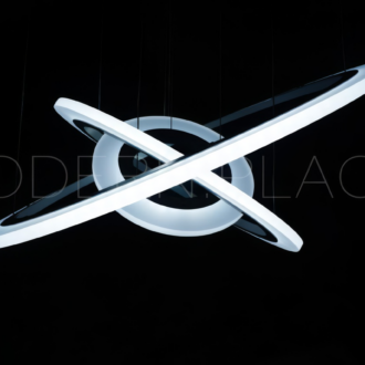 Modern circular LED pendant light fixture against a dark background.