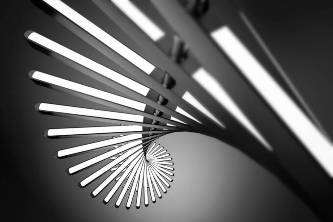 HTB1IKXZIFXXXXc7XXXXq6xXFXXXD Abstract image of metallic rods in a spiral pattern with a focus on light and shadows created by the "Piano" Pendant Light Fixture.