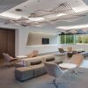 HTB1saJYJXXXXXcmXFXXq6xXFXXXL Modern office lounge area with stylish lighting and furniture.