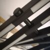 IMG_20171206_112410 Close-up of modern black window blinds with sleek design.