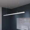 silver-led-pendant-linear-fixture Modern kitchen with sleek LED pendant light over marble countertop.