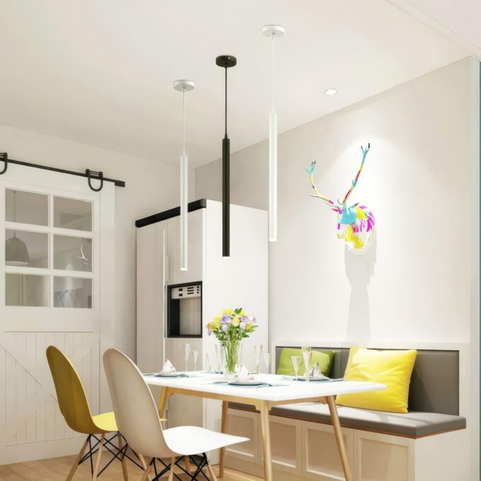 dinning-table-mini-pendant-white-black Modern kitchen diner with colorful wall art, pendant lights, and dining table setup.