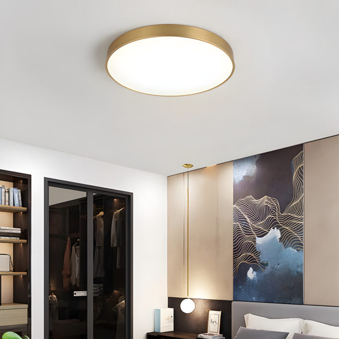 Modern bedroom interior with flush mount ceiling light and art decor.