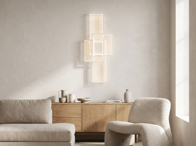 blocks_living_room_white Modern minimalist living room with abstract wall art, wooden sideboard, and neutral furniture.