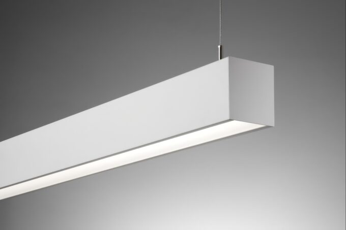 44pdled_side Modern suspended LED light fixture in a white minimalist design.