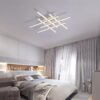 NEO-Gleam-Ideal-Modern-Led-Ceiling-Lights-For-Living-Room-Study-Room-Bedroom-Home-Dec-AC85.jpg (1) Modern bedroom with stylish ceiling light fixture and elegant decor.