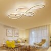 modern-lighting-ribbon-2 Modern living room with stylish ceiling light and cozy interior design.