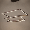 59471f85-a504-4406-ba59-b4cbd484986b Modern geometric pendant light with three illuminated rectangular frames, suspended by cables.