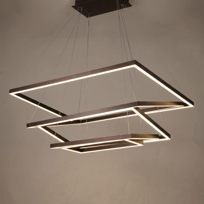 59471f85-a504-4406-ba59-b4cbd484986b Modern geometric pendant light with three illuminated rectangular frames, suspended by cables.