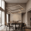 f2c22778-b85c-4235-8522-ec2365071cc6 Modern dining room with stylish pendant light, round table, and elegant chairs in neutral tones.