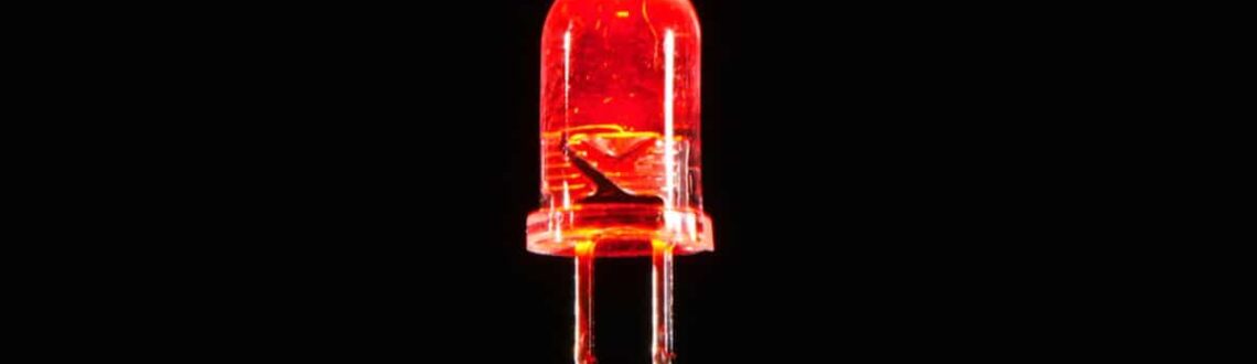 Glowing red LED against a dark background.