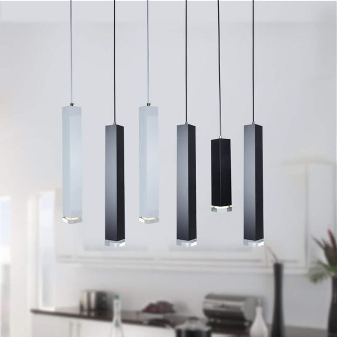 mini-pendants-square Modern hanging pendant lights over kitchen island in a home setting.