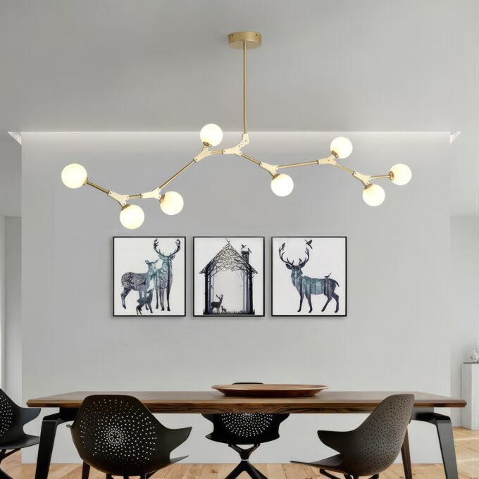 Contemporary black pendant light illuminating a spacious living room with neutral decor.