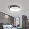 Factory-Outlet-Modern-LED-chande Modern LED ceiling light in a stylish bedroom interior design.
