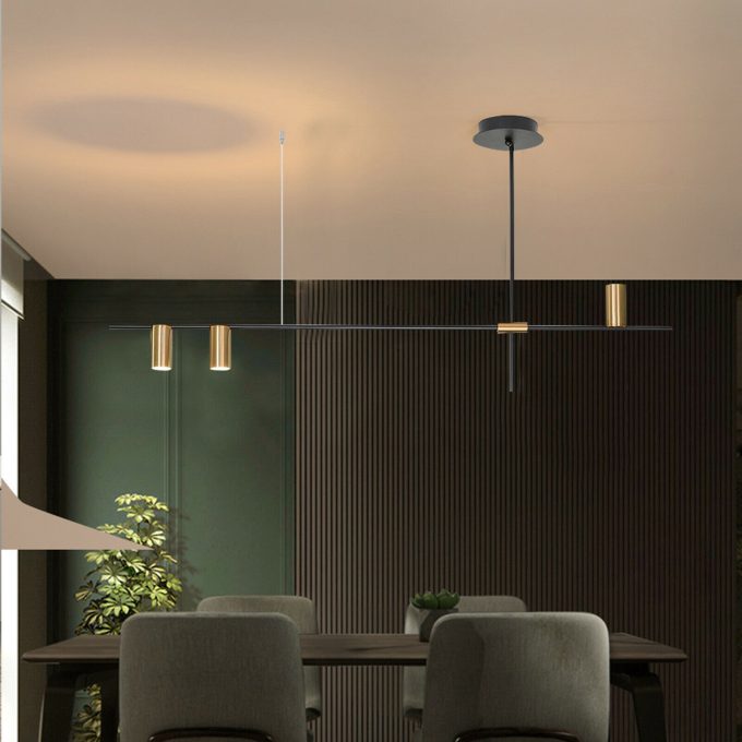 mid-century-astral Modern pendant lights over a stylish dining room table setup.