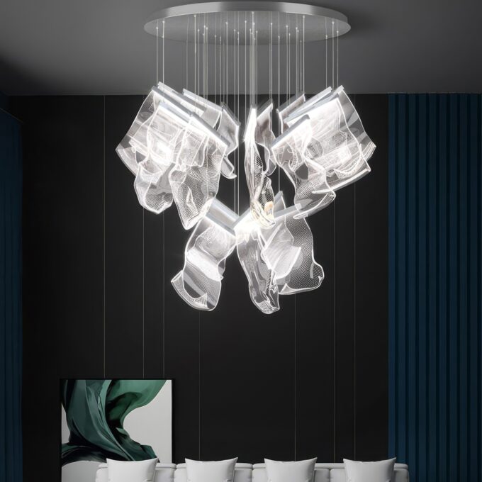 5 Modern glass chandelier in a contemporary room with white chairs.