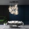 6 Modern living room with chic sofa and unique hanging light fixture.