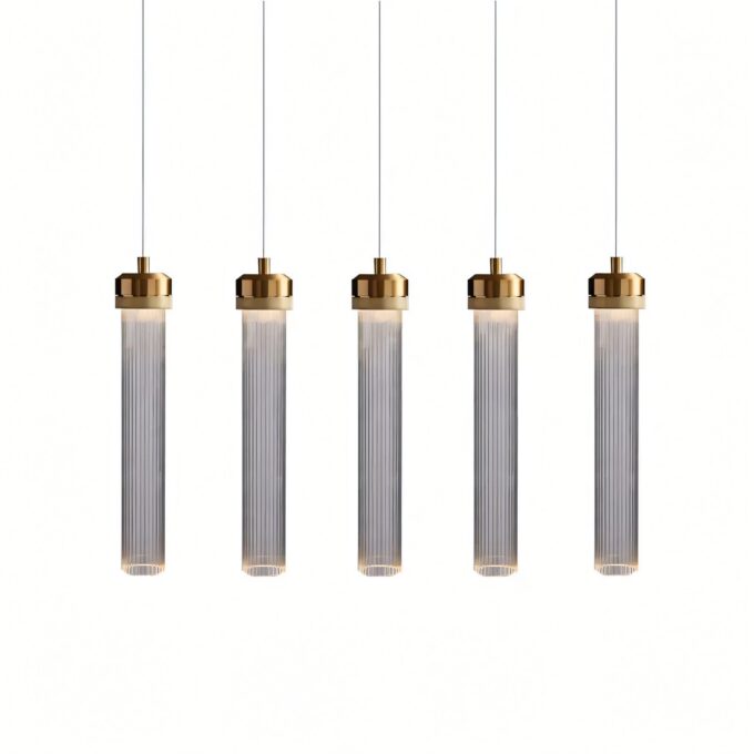 Modern gold and glass pendant lights in a row on white background