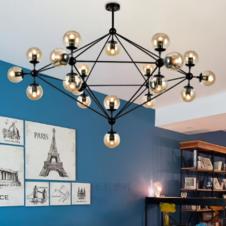 Modern geometric chandelier in stylish room with blue wall and art prints, featuring Eiffel Tower illustration.