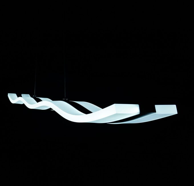 2 Modern wavy LED pendant light fixture against a dark background.