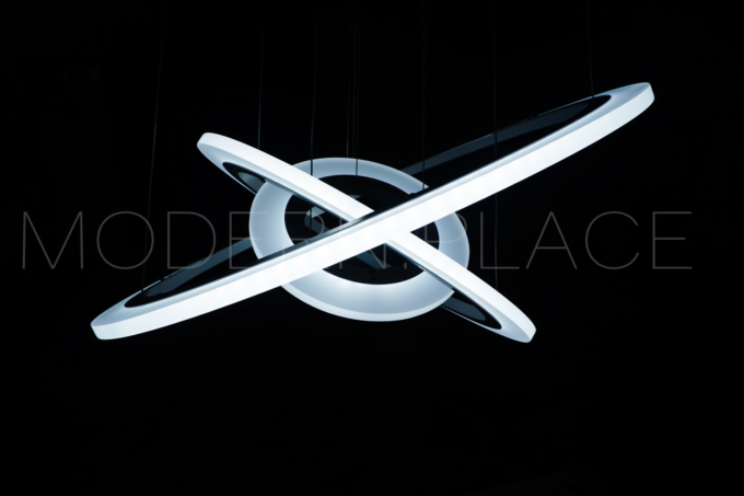 3_ring_led_pendant_light_fixture_acrylic_hanging_chandelier_lights Modern circular LED pendant light fixture against a dark background.