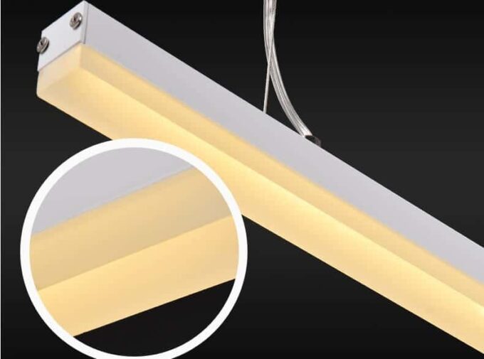 HTB1xvvcJFXXXXaqXpXXq6xXFXXXx Suspended LED linear light fixture with a warm glow, detailed close-up.