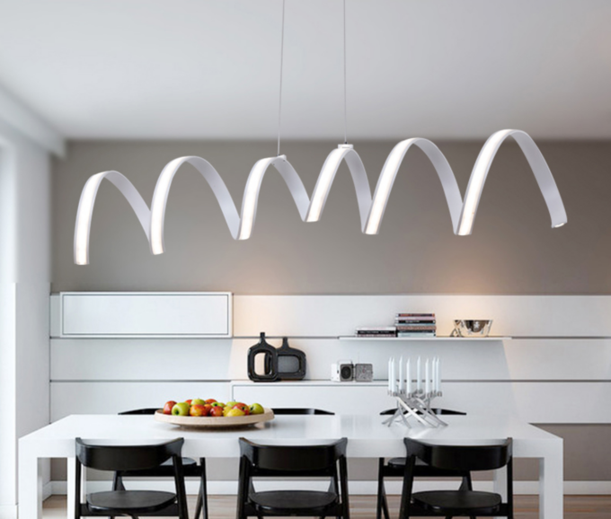2304ffa4b0b25914eee71ba9bcfcb674 Modern white kitchen with stylish wave-shaped pendant lights over table.