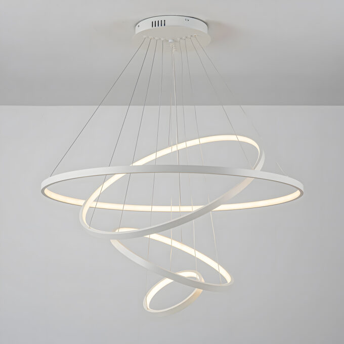 Modern LED pendant light with circular designs hanging from ceiling