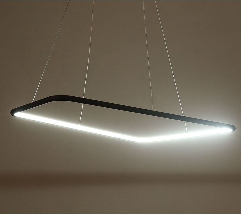 Modern LED pendant light fixture with a sleek design hanging from a ceiling.