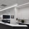 72_396_fr_statesboro_plastic_surgery_web_01 Modern office reception area with clean design and LED lighting.