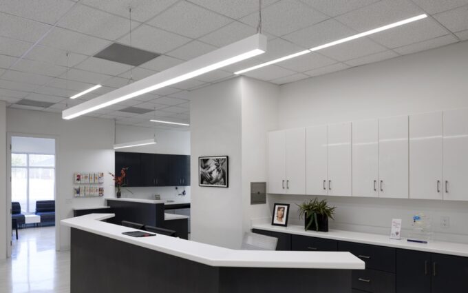 72_396_fr_statesboro_plastic_surgery_web_01 Modern office reception area with clean design and LED lighting.