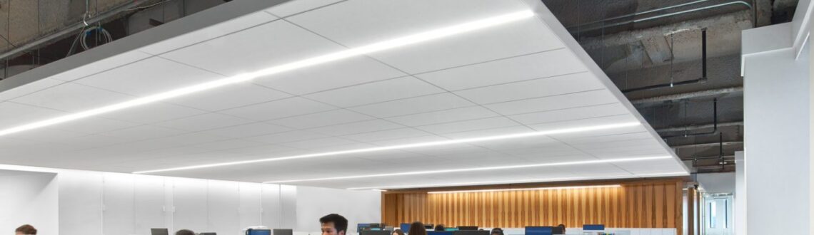 Young professionals networking at a Year Up NYC event in an office setting