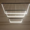 LC-011-AC14-S01-A- (13) Modern LED pendant lights in geometric shapes hanging from ceiling.