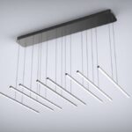 Modern suspended LED chandelier with linear design in a minimalist setting