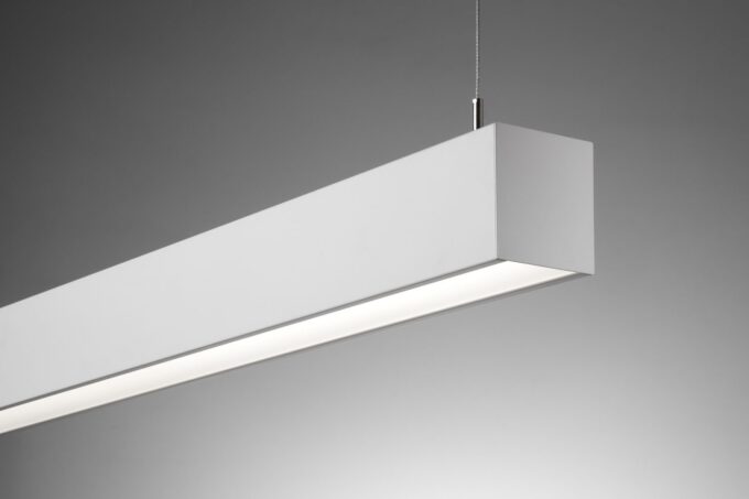 44pdled_side Modern suspended LED light fixture in a white minimalist design.