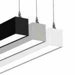 Modern pendant lights in black, gray, and white, suspended by cables, offering a sleek and minimalist design.