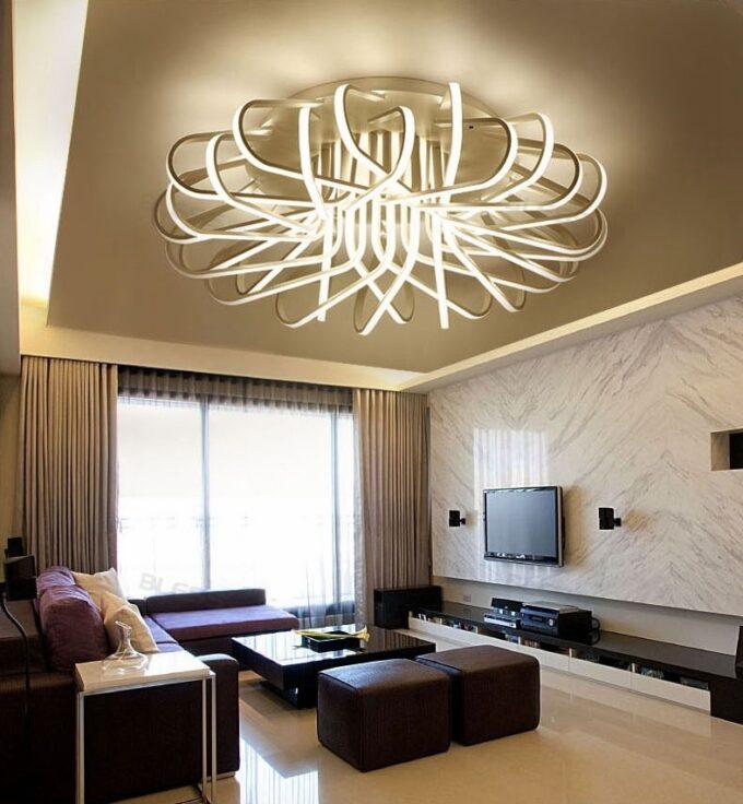 Modern living room with stylish geometric ceiling light fixture.