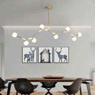 Contemporary black pendant light illuminating a spacious living room with neutral decor.