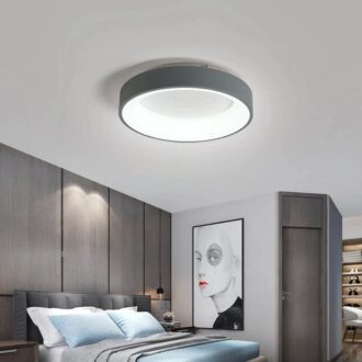 Modern LED ceiling light in a stylish bedroom interior design.