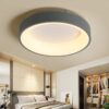 modern-place-Round-Square-Modern-Lamp Modern LED ceiling light in a stylish bedroom interior.