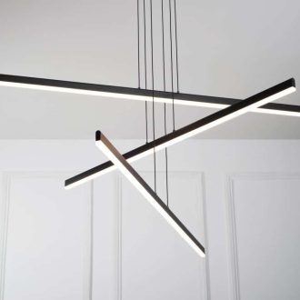 Modern LED pendant light fixture with a geometric design, hanging in a room with white walls.