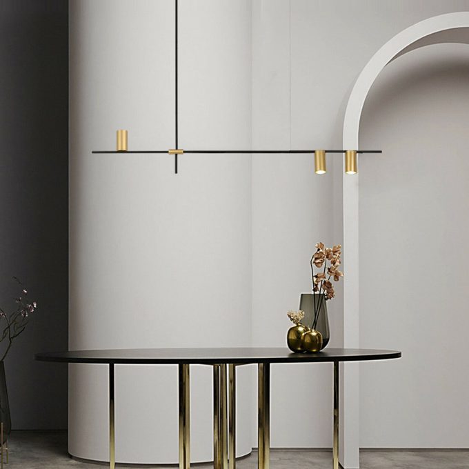 $_10 (1) Modern minimalist interior with elegant pendant lighting and round table.