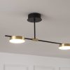 MC1541R-2 (3) Modern black and gold ceiling light fixture in a white room.