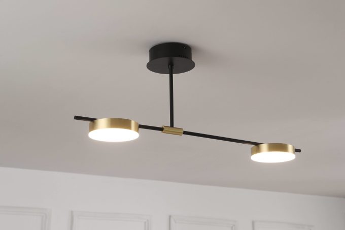 MC1541R-2 (3) Modern black and gold ceiling light fixture in a white room.