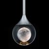 51F9MH4K46L._AC_SL1000_ Moon illusion in wine glass against black background, creative concept
