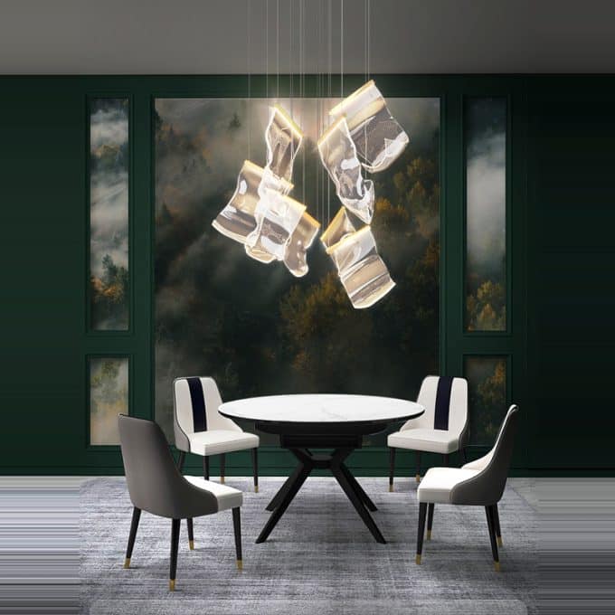 4 Modern dining room with artistic chandelier and forest view windows.