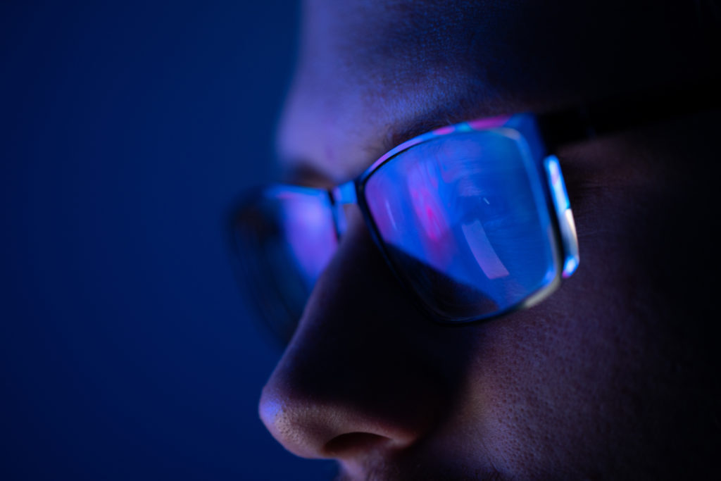 blue light reflected on glasses