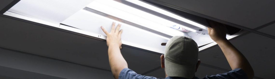 Man Installing New Light Fixture