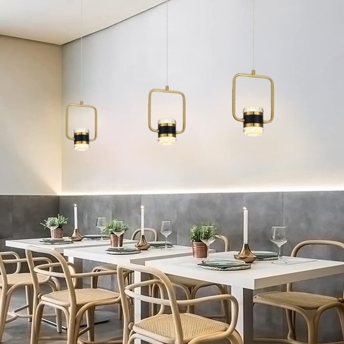 61uJzvQlgzL._AC_SL1000_ Modern dining room with elegant pendant lights and Scandinavian style decor.