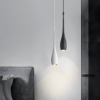 Drop-shapes-pendant-light-2 Modern pendant lights in black and white over elegant interior.